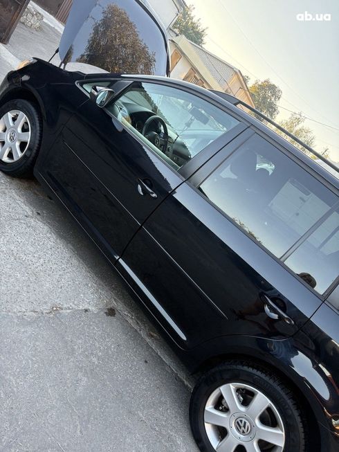 Volkswagen Touran 2010 черный - фото 10