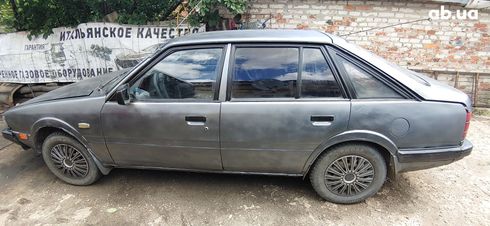 Mazda 626 1986 серый - фото 3