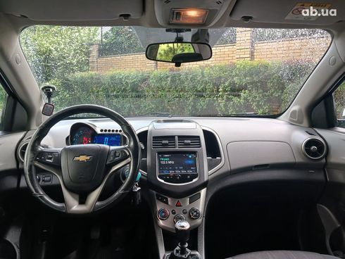 Chevrolet Aveo 2013 белый - фото 18