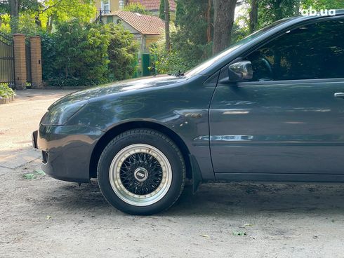 Mitsubishi Lancer 2003 черный - фото 11