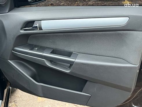 Opel Astra 2006 черный - фото 15