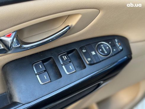 Kia Carnival 2017 белый - фото 23
