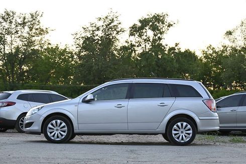 Opel Astra 2010 - фото 5