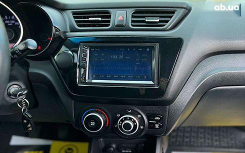 Kia Rio 2013 - фото 11