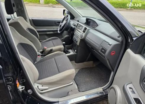 Nissan Navara 2006 черный - фото 12