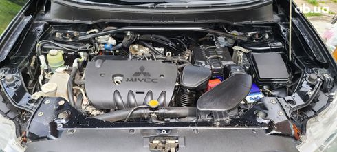 Mitsubishi Outlander XL 2011 черный - фото 11