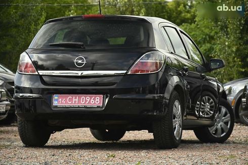 Opel Astra 2009 - фото 13