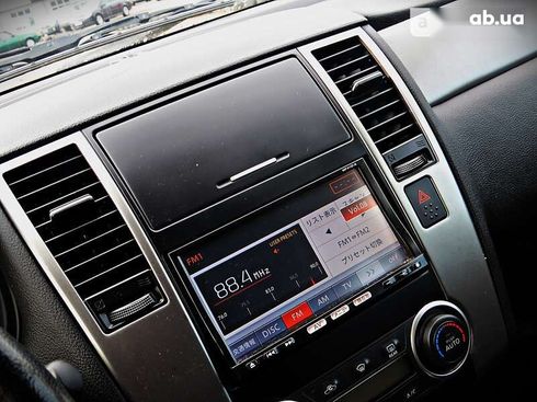 Nissan Tiida 2011 - фото 12