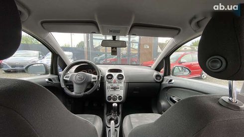 Opel Corsa 2011 - фото 17