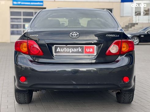 Toyota Corolla 2008 черный - фото 8