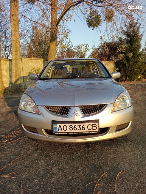 Mitsubishi Lancer 2003 серебристый - фото 3