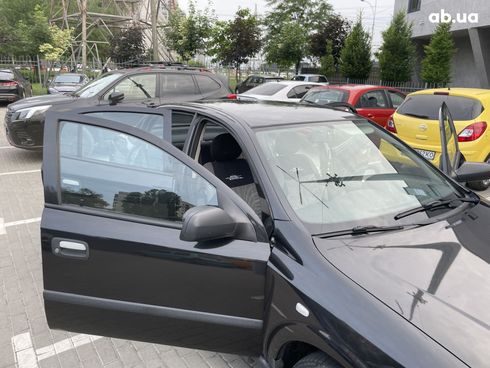 Opel Astra G 2008 черный - фото 16