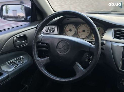 Mitsubishi Lancer 2006 - фото 14