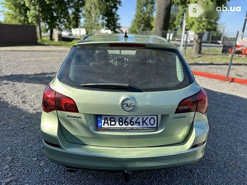 Opel Astra 2011 - фото 16