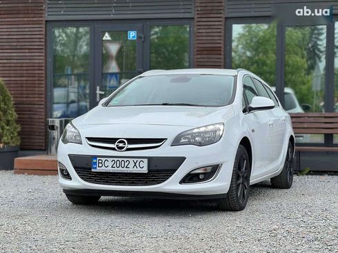 Opel Astra 2014 - фото 3