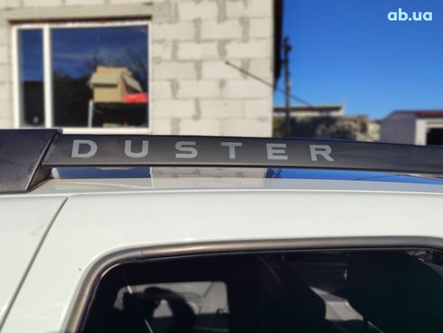 Dacia Duster 2016 белый - фото 17