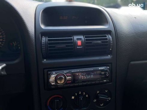 Opel Astra 2008 - фото 29
