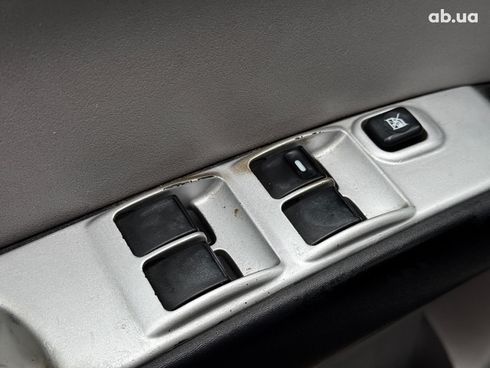 Mitsubishi l 200 2009 черный - фото 10