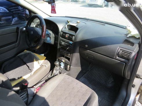 Opel Astra 2003 - фото 17