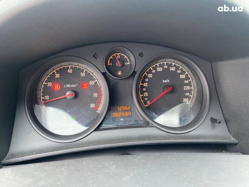 Opel Astra 2011 серый - фото 16