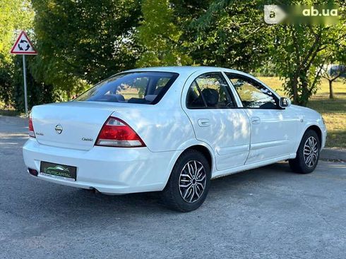 Nissan Almera 2011 - фото 6