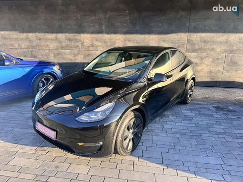 Tesla Model Y 2024 - фото 20