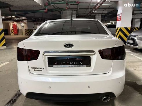 Kia Cerato 2011 - фото 8