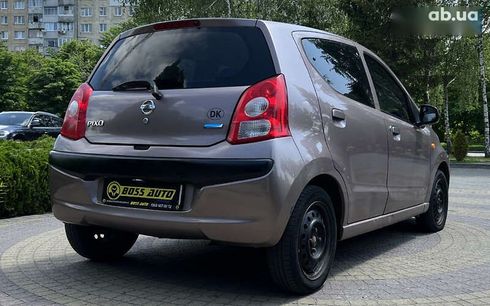 Nissan Pixo 2010 - фото 7