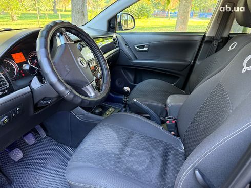 SsangYong Korando 2012 черный - фото 11