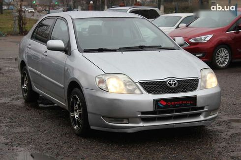 Toyota Corolla 2004 - фото 4