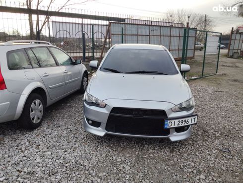 Mitsubishi Lancer 2008 серебристый - фото 2