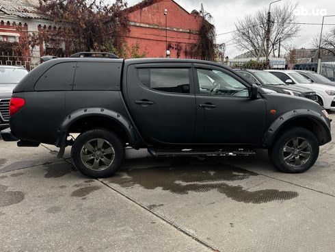 Mitsubishi l 200 2009 черный - фото 7