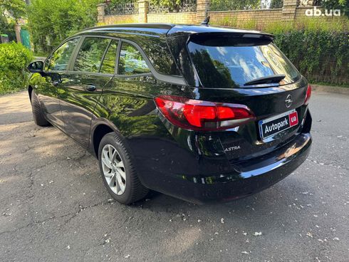 Opel Astra 2022 черный - фото 8