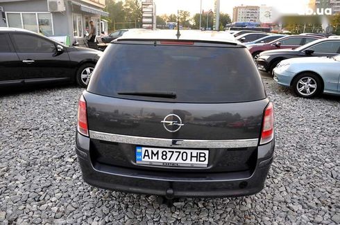 Opel Astra 2010 - фото 8