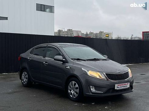 Kia Rio 2013 - фото 6