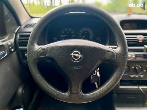 Opel Astra 2008 - фото 27