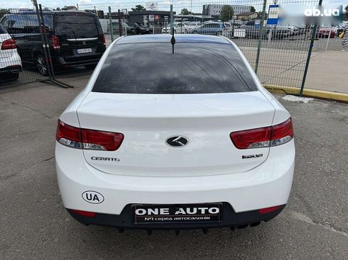 Kia Cerato 2011 - фото 9
