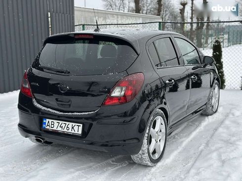 Opel Corsa 2010 - фото 11