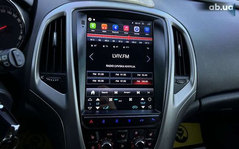 Opel Astra 2011 - фото 17
