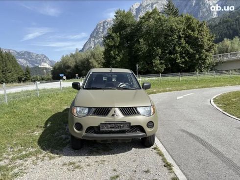 Mitsubishi L200 2010 зеленый - фото 2