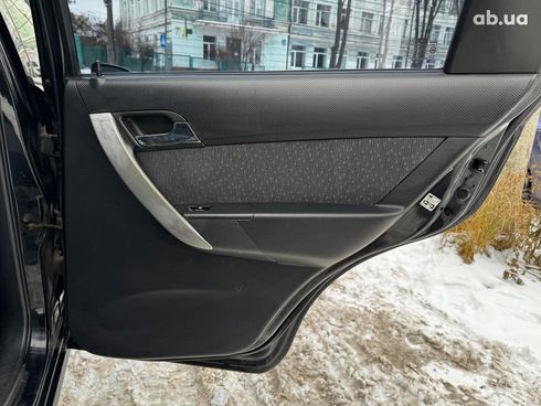 Chevrolet Aveo 2008 черный - фото 27