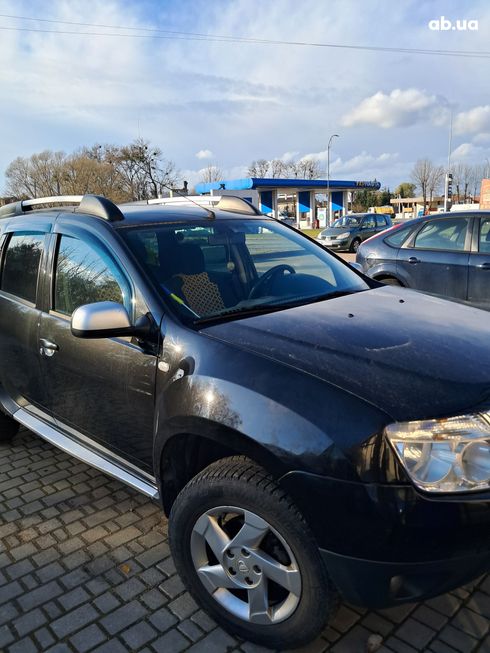 Dacia Duster 2011 черный - фото 3