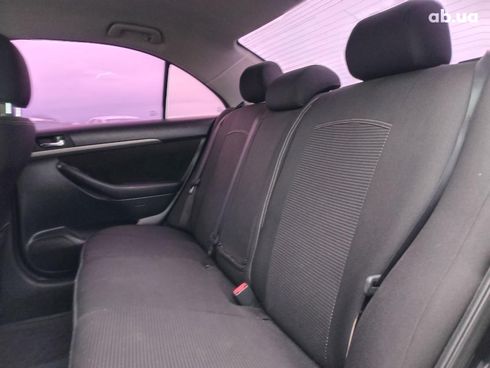 Toyota Avensis 2008 черный - фото 18