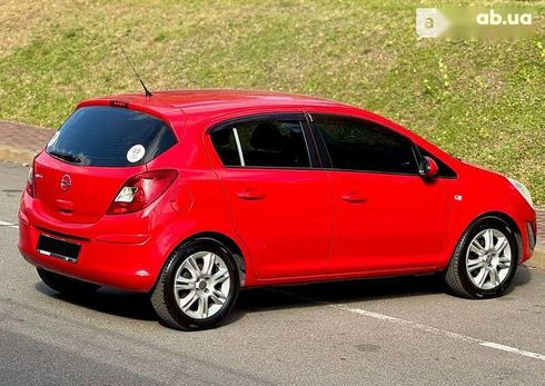 Opel Corsa 2011 - фото 12