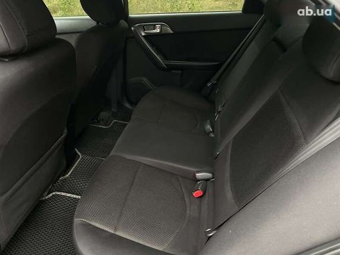 Kia Cerato 2011 - фото 24