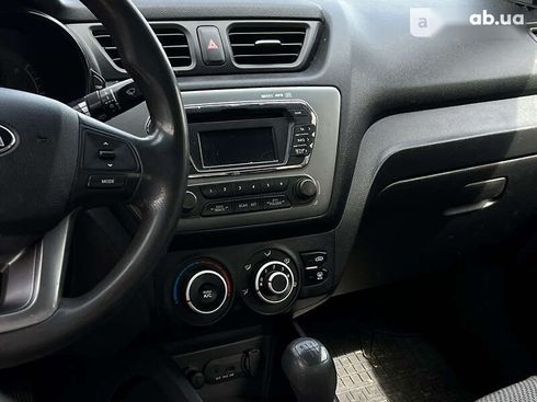 Kia Rio 2014 - фото 9