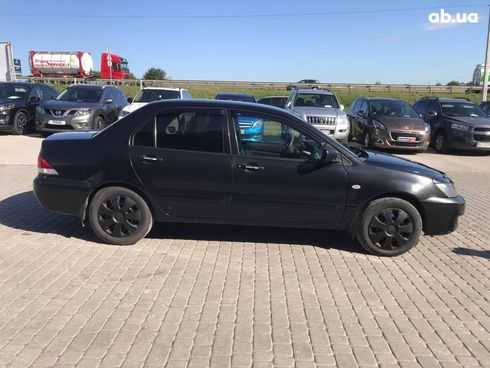 Mitsubishi Lancer 2008 черный - фото 10