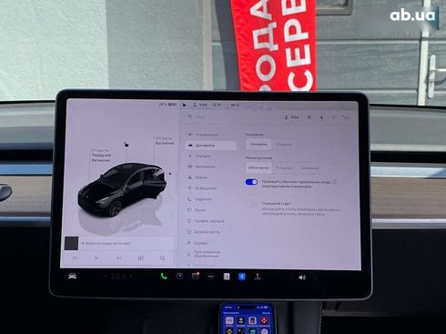 Tesla Model Y 2024 - фото 17