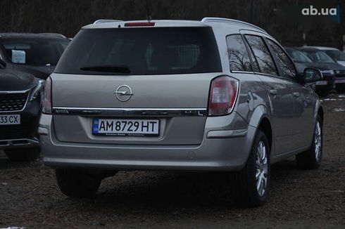 Opel Astra 2009 - фото 9