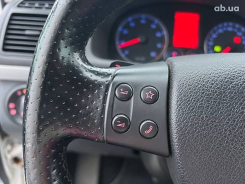 Volkswagen Touran 2009 белый - фото 24